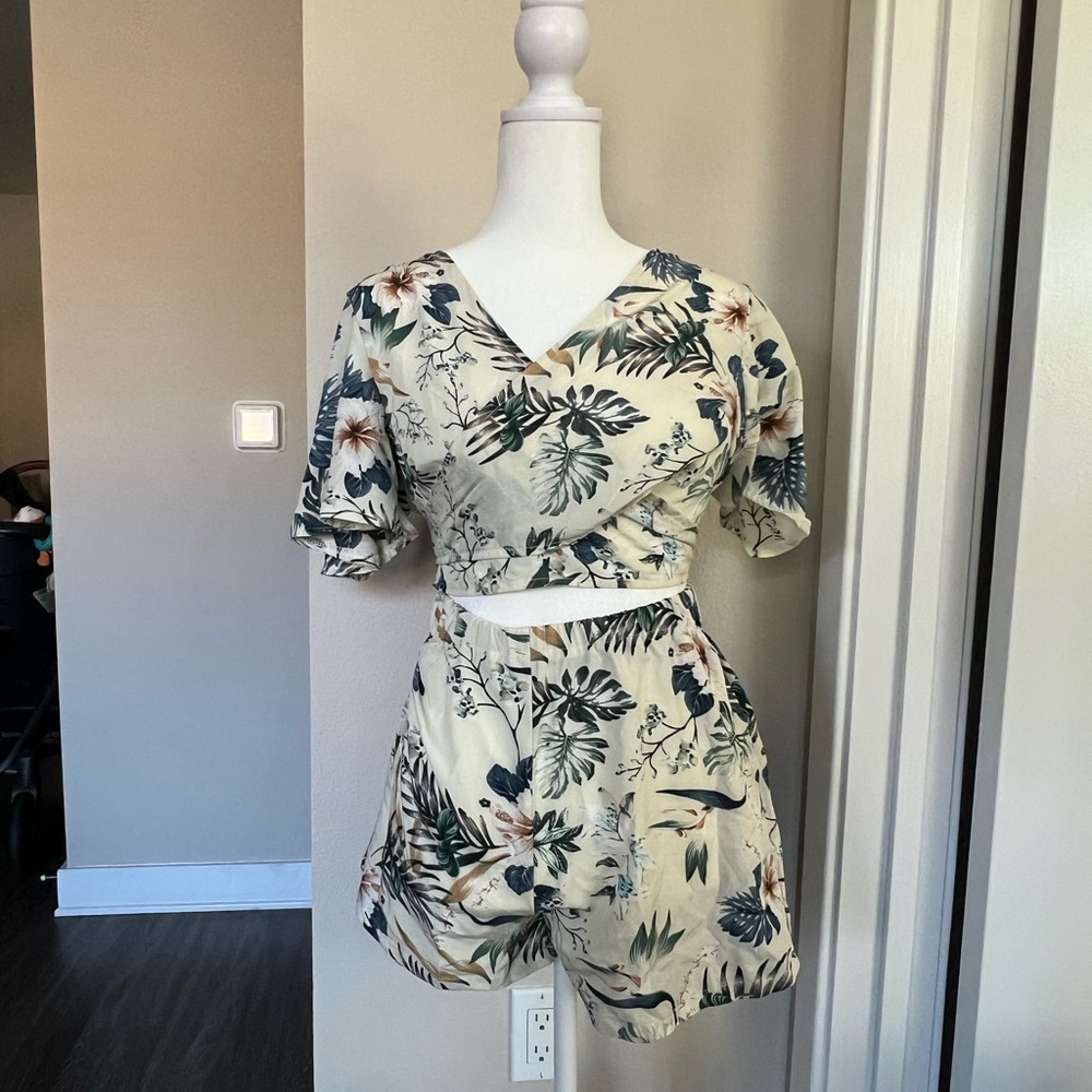 Two piece white tropical print set with wrap around crop top and short